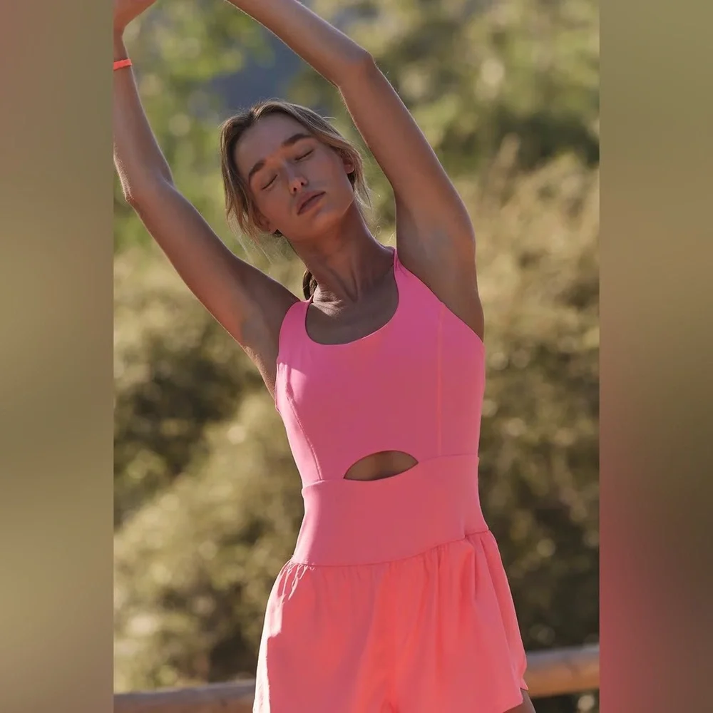 NWT Free People Movement Righteous Runsie Flamingo Fizz Pink Cutout Romper - Picture 11 of 11